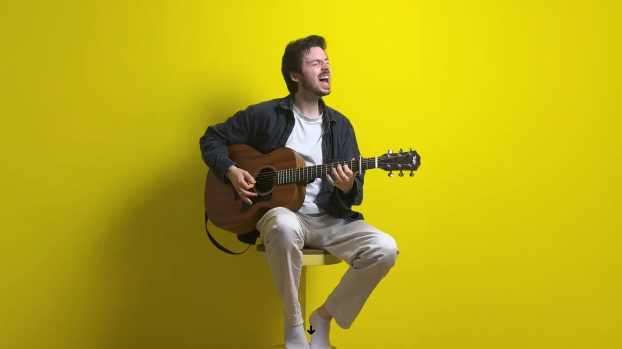 Keenan Back playing acoustic guitar